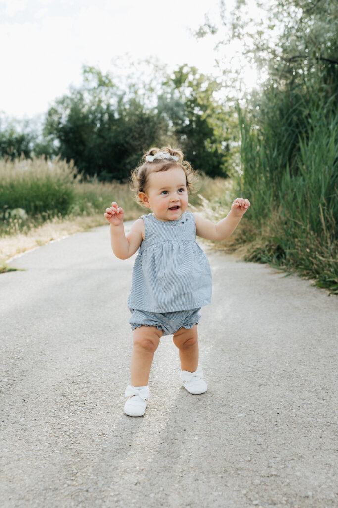 A cute little girl at the bountiful pond.