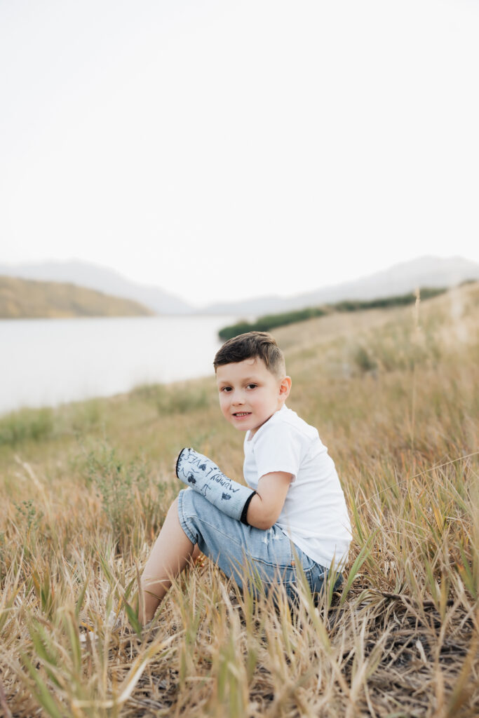 Little boy sitting down.